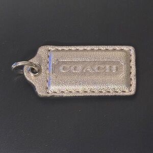 Coach metallic silver leather hang tag